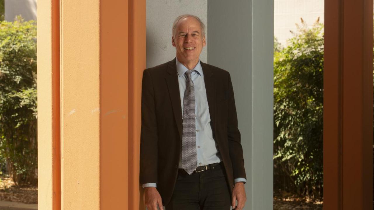 Portrait of alum Alan Templeton outdoors.