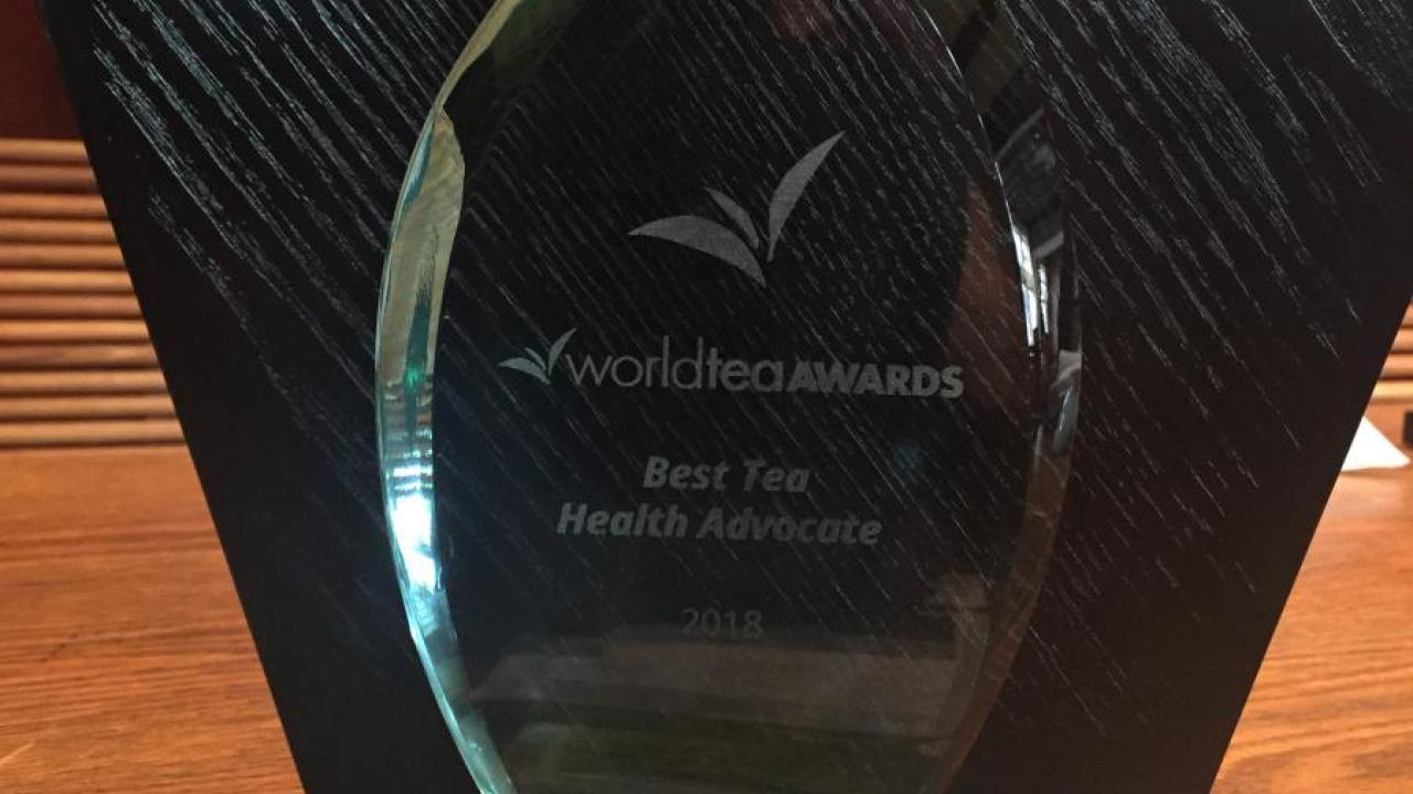 Glass trophy awarded to Katharine Burnett for Best Tea Health Advocate at the World Tea Expo.