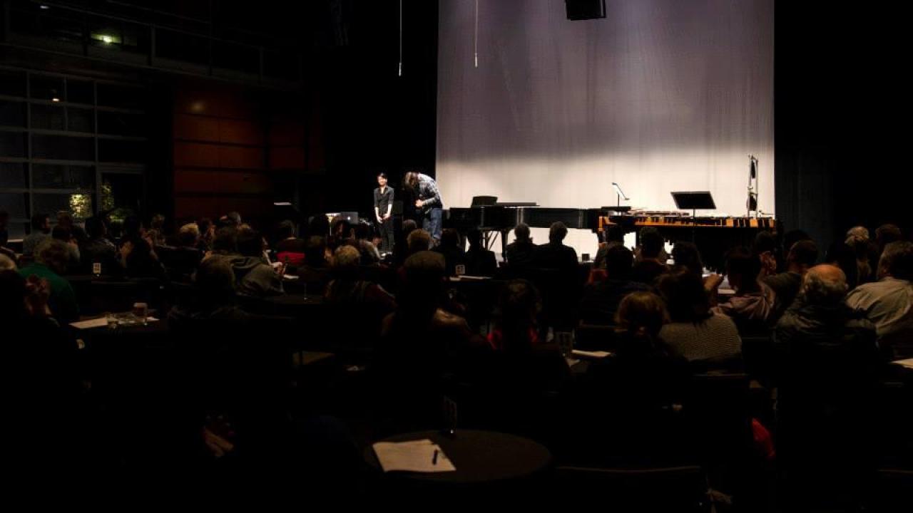 Megan Shieh with composer Dan VanHassel, after performing the solo snare drum and electronics piece "fzzl."