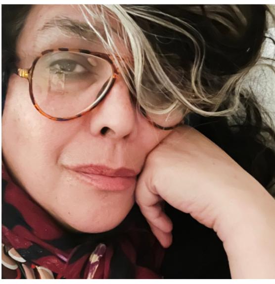 Catherine Castellanos (courtesy photo) Woman with glasses staring into the camera